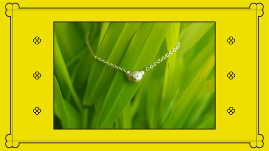 photo of the Winsome Bear necklace on a white background with Gatto Mancini logo