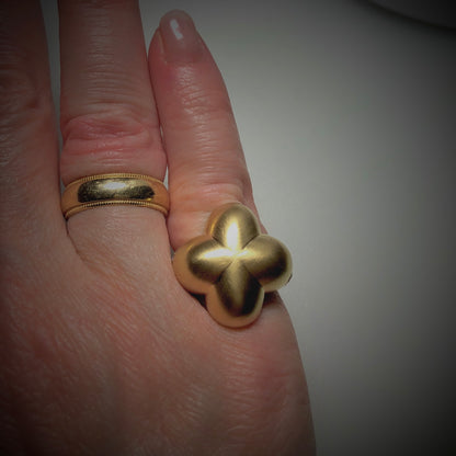 Gatto Mancini Ring No. 2 Pinky Style in 18k brushed matte finish yellow gold with heart of diamonds on a woman's hand.