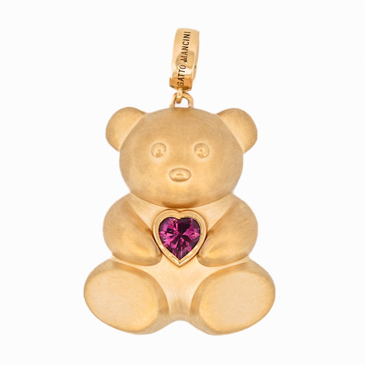 A luxurious Winsome Bear Pendant by Gatto Mancini in 18k yellow gold adorned with a pink gemstone.